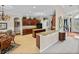 Spacious kitchen and breakfast nook featuring dark wood cabinetry and stainless steel appliances at 13538 Thoroughbred Dr, Dade City, FL 33525