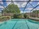 Stunning pool with spa and golf course views at 13538 Thoroughbred Dr, Dade City, FL 33525