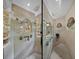 Contemporary shower with glass block accents and tiled design at 13538 Thoroughbred Dr, Dade City, FL 33525