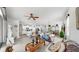 The living room, dining room, and kitchen share an open floor plan at 13749 Hunting Creek Pl, Spring Hill, FL 34609
