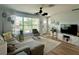 Inviting living room with comfortable seating, natural light, and stylish decor at 14019 89Th Ave, Seminole, FL 33776