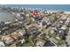 A wide aerial view captures the property's location relative to the local waterways and white sand beaches at 187 145Th E Ave # 4, St Petersburg, FL 33708