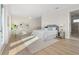 Spacious bedroom with light colored walls and floors at 187 145Th E Ave # 4, St Petersburg, FL 33708