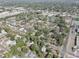 Expansive aerial view of a residential neighborhood with mature trees and well-maintained streets at 2009 E Eskimo Ave, Tampa, FL 33604