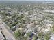 Aerial view showcasing the neighborhood with mature trees and streets at 2009 E Eskimo Ave, Tampa, FL 33604