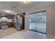 Functional kitchen with stainless steel appliances and sliding doors to the outside at 2009 E Eskimo Ave, Tampa, FL 33604