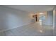 Open living space with tile flooring, and backyard access, ideal for entertaining at 2009 E Eskimo Ave, Tampa, FL 33604