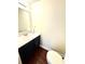 Half bathroom with vanity, sink, and toilet at 2302 Maki Rd # 24, Plant City, FL 33563