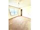 Bedroom with carpet flooring and standard window at 2302 Maki Rd # 24, Plant City, FL 33563