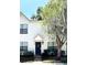 Charming two-story home with a welcoming front entrance and lush landscaping at 2302 Maki Rd # 24, Plant City, FL 33563