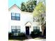 Inviting two-story home with well-maintained landscaping and a cozy entrance at 2302 Maki Rd # 24, Plant City, FL 33563