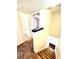 Hallway showcasing carpeted steps and access to the bathroom and bedroom at 2302 Maki Rd # 24, Plant City, FL 33563