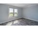 Bright bedroom with hard surface floors, a window for natural light and scenic views at 2618 Cove Cay Dr # 801, Clearwater, FL 33760