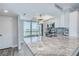 Bright kitchen features granite countertops, stainless appliances and a view to the outside at 2618 Cove Cay Dr # 801, Clearwater, FL 33760