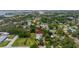 Aerial view of the property showing the house nestled among lush greenery at 2623 57Th S St, Gulfport, FL 33707