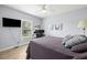 Light-filled bedroom boasts a ceiling fan, and large window with natural light at 2623 57Th S St, Gulfport, FL 33707