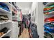 Walk-in closet with built-in shelving, drawers, and ample storage space at 2623 57Th S St, Gulfport, FL 33707