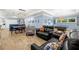 Spacious living room with dining area, pool table, and comfortable seating for entertaining at 2623 57Th S St, Gulfport, FL 33707