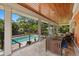 Outdoor patio with tongue and groove ceiling overlooks the refreshing pool and private backyard at 2623 57Th S St, Gulfport, FL 33707