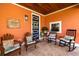 Inviting porch features ample seating, decorative touches, and a warm, welcoming atmosphere at 2623 57Th S St, Gulfport, FL 33707