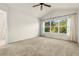 Large primary bedroom with lots of natural light from a big window at 26517 Castleview Way, Wesley Chapel, FL 33544