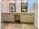 This bathroom features a double sink vanity with lots of storage and tile floors at 3000 Tangerine Ter, Palm Harbor, FL 34684