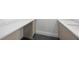 Close-up of a modern bathroom vanity with a sleek countertop at 3020 W Helen Ave, Tampa, FL 33611