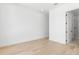 Bright bedroom showcasing sleek flooring and modern design at 3020 W Helen Ave, Tampa, FL 33611