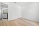 Hallway with sleek railings overlooking an open area below at 3020 W Helen Ave, Tampa, FL 33611