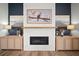 Fireplace feature wall with mantel and decor at 3409 Gulf City Rd, Ruskin, FL 33570