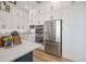 Well-equipped kitchen with stainless steel appliances and a pantry at 3409 Gulf City Rd, Ruskin, FL 33570