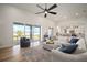 Open-concept living room with lake views and modern finishes at 3409 Gulf City Rd, Ruskin, FL 33570