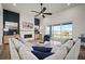 Living room featuring a fireplace, and sliding glass doors with a lake view at 3409 Gulf City Rd, Ruskin, FL 33570