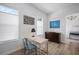 Cozy office space with natural light, functional desk, and stylish accents, perfect for a productive work environment at 3409 Gulf City Rd, Ruskin, FL 33570