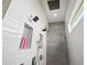 Elegant shower stall features a rainfall shower head and built-in shelves for toiletries at 3409 Gulf City Rd, Ruskin, FL 33570