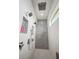 Elegant shower stall features a rainfall shower head and built-in shelves for toiletries at 3409 Gulf City Rd, Ruskin, FL 33570