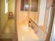 Bathroom featuring a vanity with a sink, stylish decor, and bright natural light at 4179 Juniper St, Port Charlotte, FL 33948