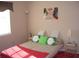 Bedroom showcasing a bright window, stylish decor, with comfortable sleeping arrangements and a ceiling fan at 4179 Juniper St, Port Charlotte, FL 33948