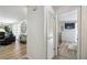 Inviting hallway with views into the living room and bedroom at 4240 Woodsville Dr, New Port Richey, FL 34652