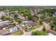 An aerial view of a single Gathering home, showcasing the property and the neighborhood, with a private backyard pool at 477 44Th N Ave, St Petersburg, FL 33703