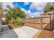 Spacious backyard with paver patio, wooden fence, lush landscaping, and secure gate for privacy at 477 44Th N Ave, St Petersburg, FL 33703