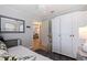 Bright bedroom featuring a wardrobe closet, and a view into the rest of the home at 477 44Th N Ave, St Petersburg, FL 33703