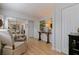 Charming dining room boasts stylish decor, wood floors, and open layout to the rest of the home at 477 44Th N Ave, St Petersburg, FL 33703