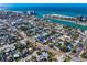 A vibrant coastal neighborhood with houses, palm trees, and stunning ocean views at 500 79Th Ave, St Pete Beach, FL 33706