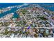 Overhead view of a residential community surrounded by the ocean and inter-coastal waterways at 500 79Th Ave, St Pete Beach, FL 33706