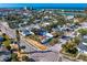 Coastal neighborhood featuring a home with a pool, set near the beach and waterfront at 500 79Th Ave, St Pete Beach, FL 33706