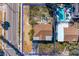 Aerial view showcasing the property lines with an inviting pool on a sunny day at 500 79Th Ave, St Pete Beach, FL 33706