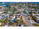 Neighborhood aerial view featuring mature trees, proximity to the beach, and community amenities at 500 79Th Ave, St Pete Beach, FL 33706