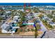 Aerial view showcasing this home's location within a vibrant residential area at 500 79Th Ave, St Pete Beach, FL 33706