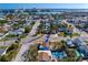 A bird's-eye view showcasing a home near the waterfront, highlighting the proximity to water and neighborhood setting at 500 79Th Ave, St Pete Beach, FL 33706